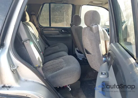 2004 GMC Envoy Sle z USA, uszkodzony, nr VIN 1GKDS13S042297056